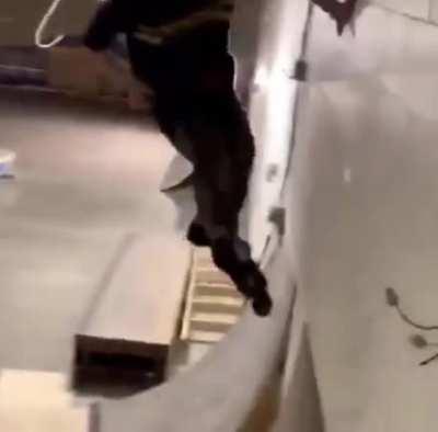 Dude handplants the wall and screws up