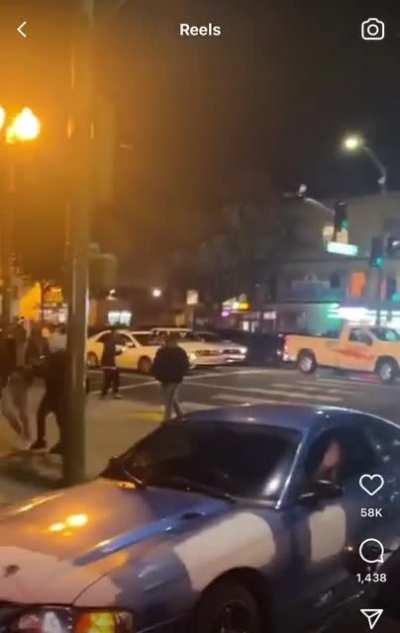 Oakland, CA.; People decide to demonstrate with some live fire while taking over a city block.