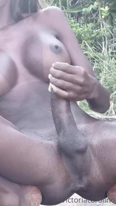 The stunningly beautiful shemale Victoria Carolino masturbates on the beach.