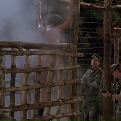 Strip search and delousing scene from the movie Opposing Force (1986)