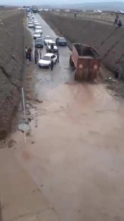 To drain water from a road.