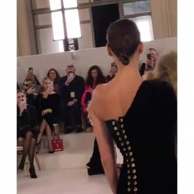 Kylie Jenner doesn’t look too happy after finding out Irina Shayk wore the same lion head dress as her at the Paris Fashion Week