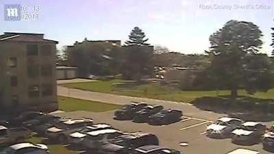 Handcuffed teen escapes police station.