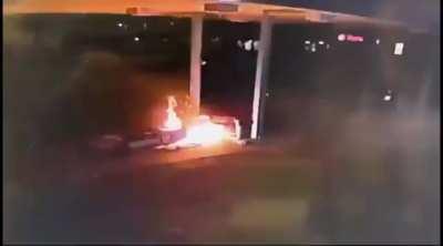 Gas station pump bursts into flames after being struck by teen driver