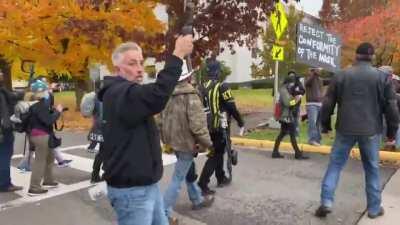 Trump supporters mace woman, chase out photographer