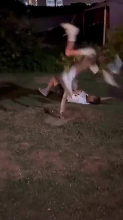 South African uni students fighting a tree.