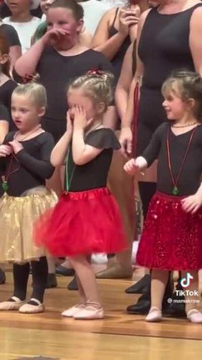 Pure joy when she finds her family in the crowd.