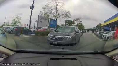 BMW driver tries to steal my parking spot then yells at me, but I manage to box him out and win it back