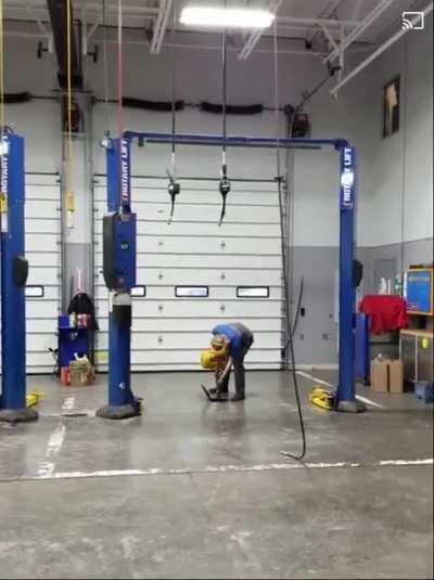 WCGW using compressed air to clean out a shop drain line.