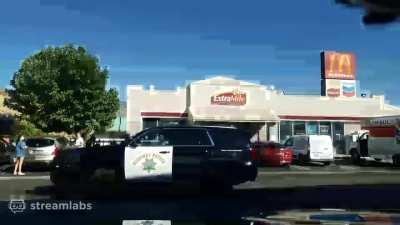 Live streamer freaks out on someone for getting too close to her car without a mask on