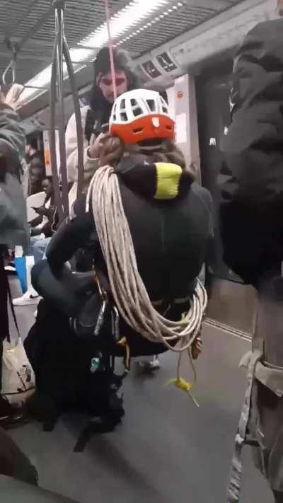 French guy ziplines on train