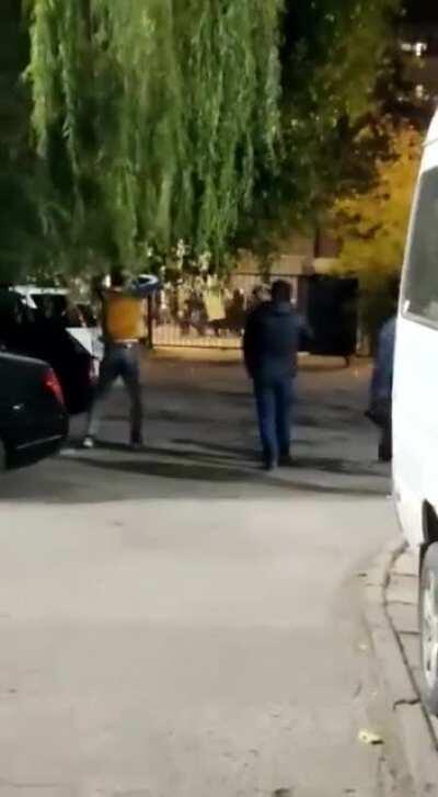 Riot police being overrun and chased in Bishkek, Kyrgyzstan.