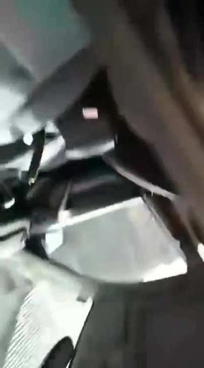 Driver slightly pissed off because a disabled woman won't let him move forward.