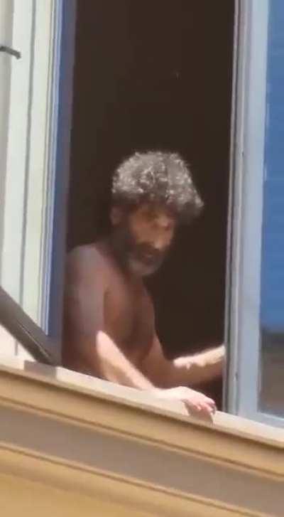 Man jumps from his window after throwing a bottle at people below