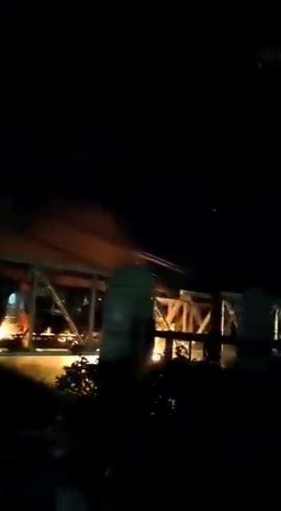 A train collides with a standstill truck resulting in an explosion in Indonesia today