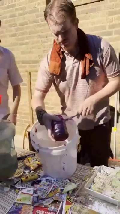 White guys imitating Indians making street food.