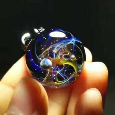 A mini galaxy in your palm.