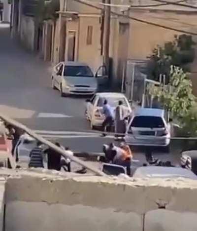 Is this a war crime? Indiscriminate killing of unarmed civilians in the back...