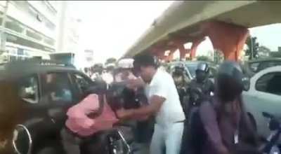Biker vs Taxi Driver on a crowded Indian street