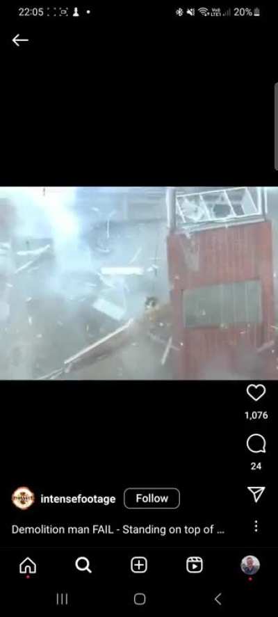 Standing on a building being demolished 