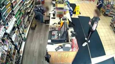 Footage of a 12 year old kid in Michigan robbing a gas station at gun point.
