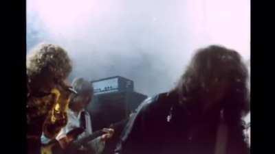Led Zeppelin performing their track “Dazed and Confused” live in London, 1969. Jimmy Page shreds while the band jams along.