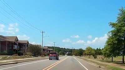 USA Distracted driving crossing double yellow line