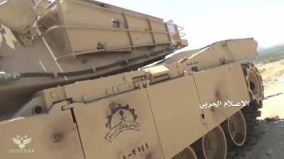 Saudi M1A1 badly damaged by Houthis. Crew member KIA at 1:00.
