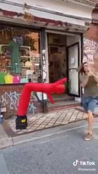 Man vs inflatable man. Biblical battle to the death.