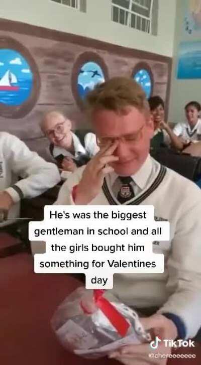 He was the Biggest gentleman in school and all the girls bought him something for valentines day