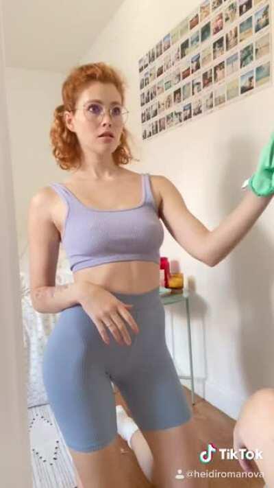 Redhead Cleaning The Mirror