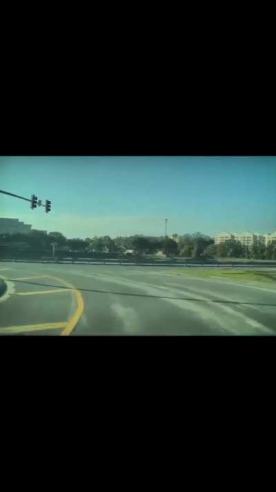 Red light runner brought to you by Nissan.