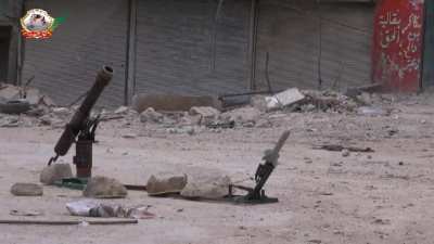 Liwa al-Tawhid engineers launch a comically small IRAM at SAA held up in Hanano Barracks, Aleppo - 2013