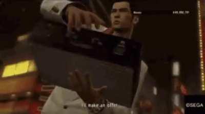 yakuza man opens suitcase full of text