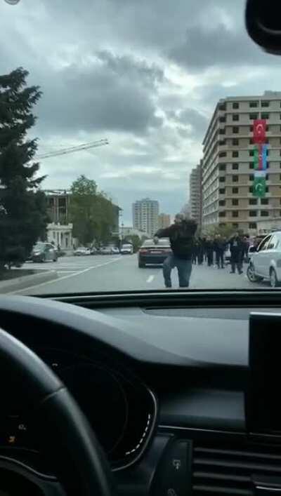 He just vibin' tho a normal day in Baku.