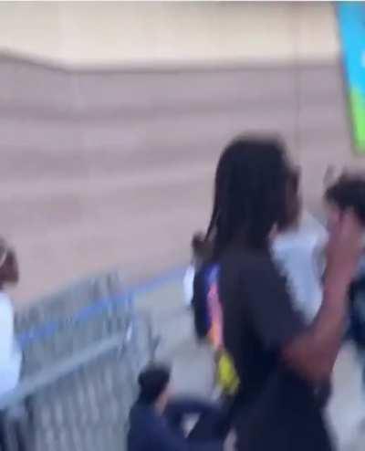 A goat listening to another goat