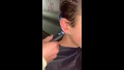 Getting a haircut in the sewers from yo homie