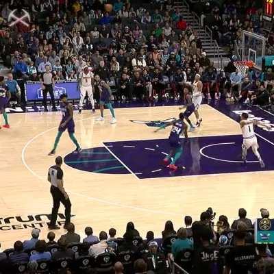 [Highlight] Jamal Murray's no-look pass whilst sitting down leads to a Jokic lob towards Michael Porter Junior