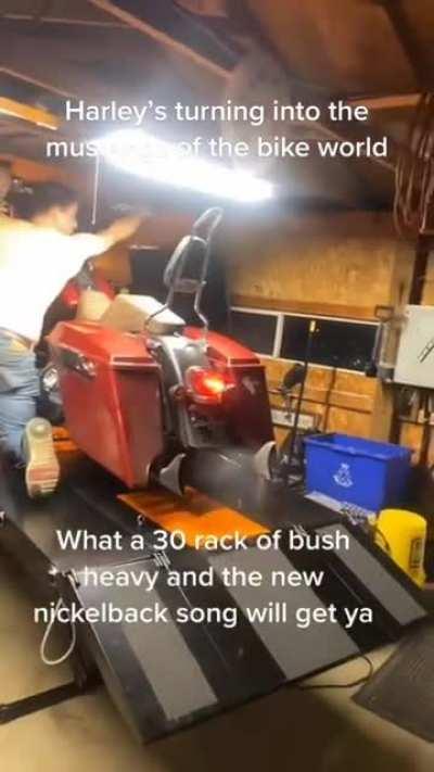 revving your Harley on a ramp in a garage