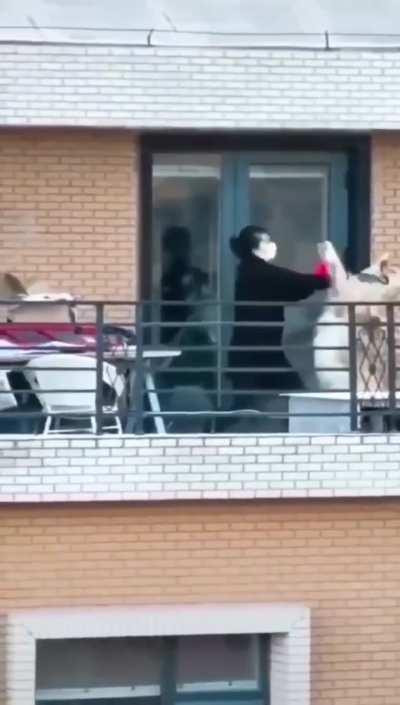 Woman and dog fight, guess who will win