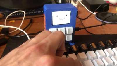 Meet KMO, a companion for your keyboard that acts as an input pass through and his own macro-pad!