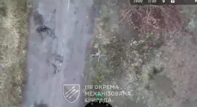Russian soldier being chased by a drone, decides to shoot himself on the run. 118th Separate Mechanized Brigade.