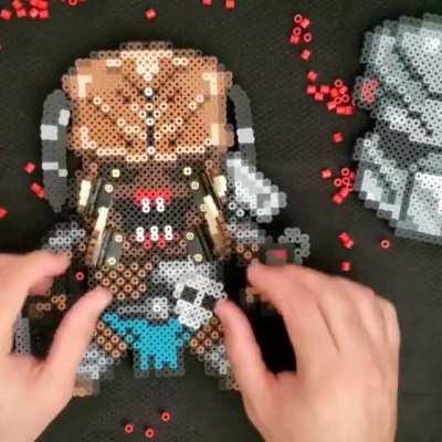 Predator made of perler beads with removable helmet and moving mandibles! FB and IG @pixelhotpr