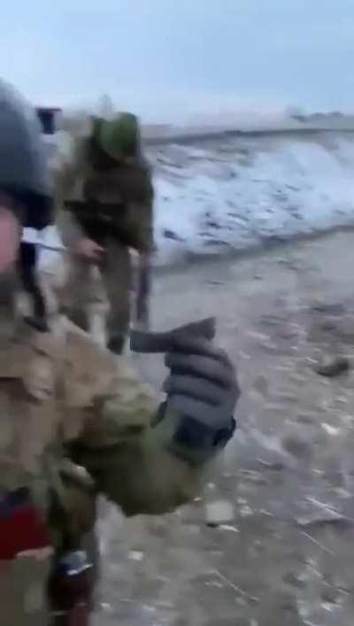 Warning: Graphic Images. Russians Lie Dead On The Battlefield On The Outskirts Of Kyiv