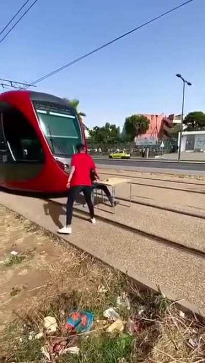 This guy in Morocco stopping a tram to shoot a video