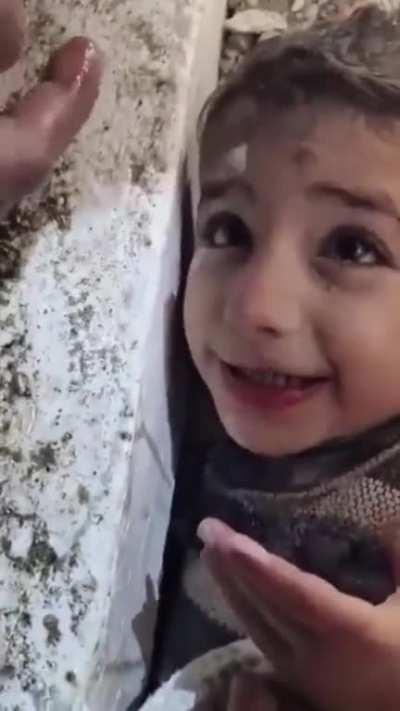 After 44 hours of devastating earthquake in Turkey, a team of heroes successfully rescued 2-year-old 'Muhammet'. The rescuers provided the dehydrated child with water.