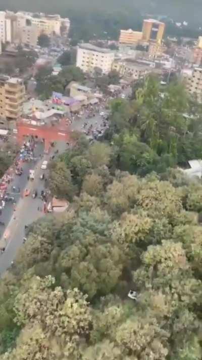 Gujarat police carrying out surveillance through paramotoring.