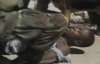 After a grenade attack that killed 5 people, American troops seize suspects and raid a warehouse in Port-au-Prince, Haiti (September 29, 1994)