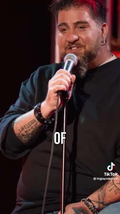 Man breaks chair at a comedy show. Tries to play it cool by sitting on the floor.