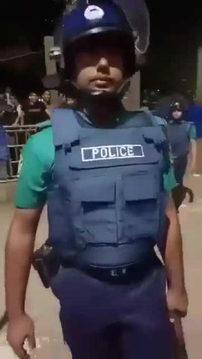 Police turns in on unarmed students at Dhaka University, Bangladesh.